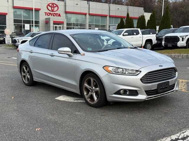 used 2015 Ford Fusion car, priced at $6,995