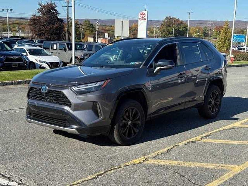 used 2022 Toyota RAV4 Hybrid car, priced at $30,000