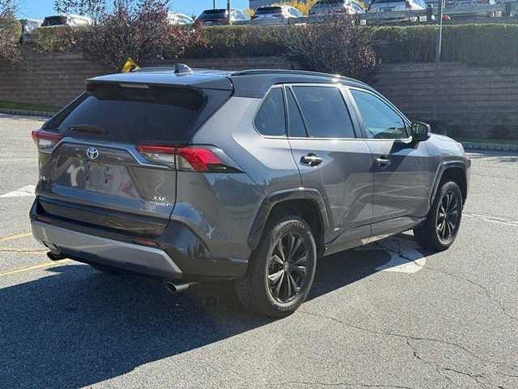 used 2022 Toyota RAV4 Hybrid car, priced at $30,000
