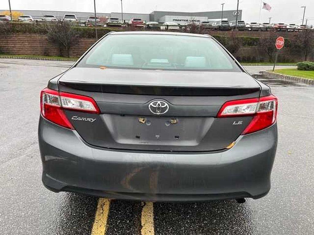 used 2014 Toyota Camry car, priced at $15,000