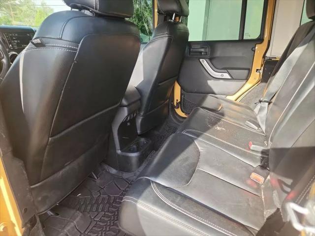 used 2013 Jeep Wrangler Unlimited car, priced at $11,931