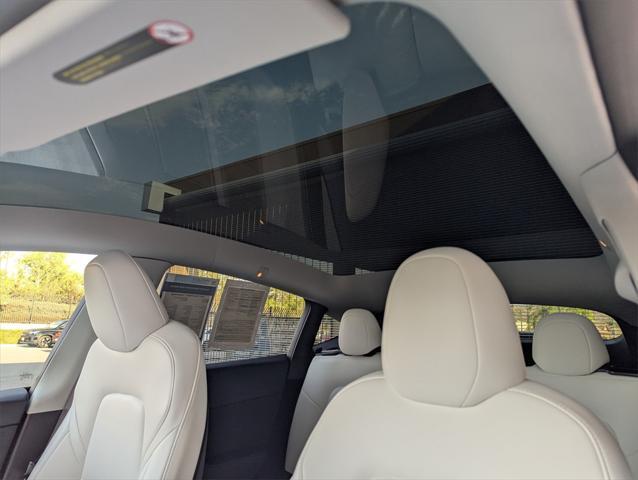 used 2024 Tesla Model Y car, priced at $32,908