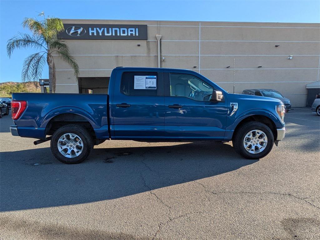 used 2023 Ford F-150 car, priced at $33,599