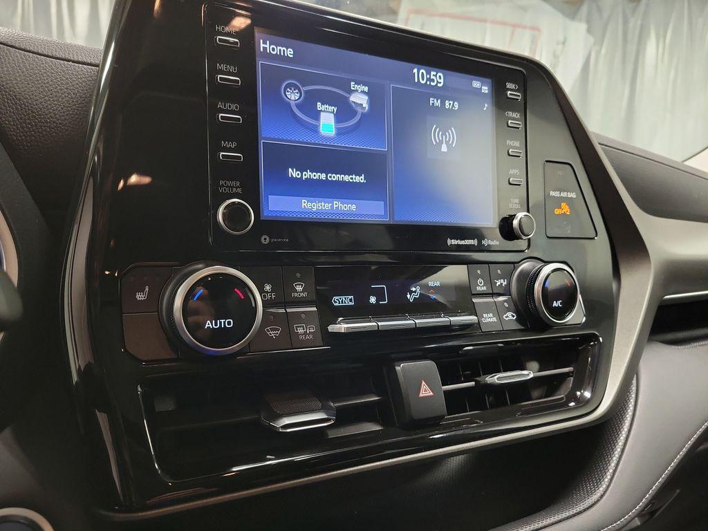 used 2021 Toyota Highlander Hybrid car, priced at $29,995