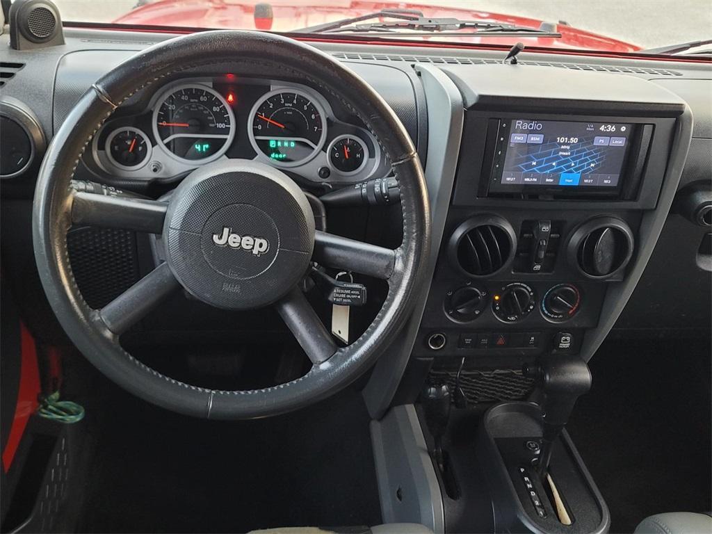 used 2010 Jeep Wrangler Unlimited car, priced at $13,303