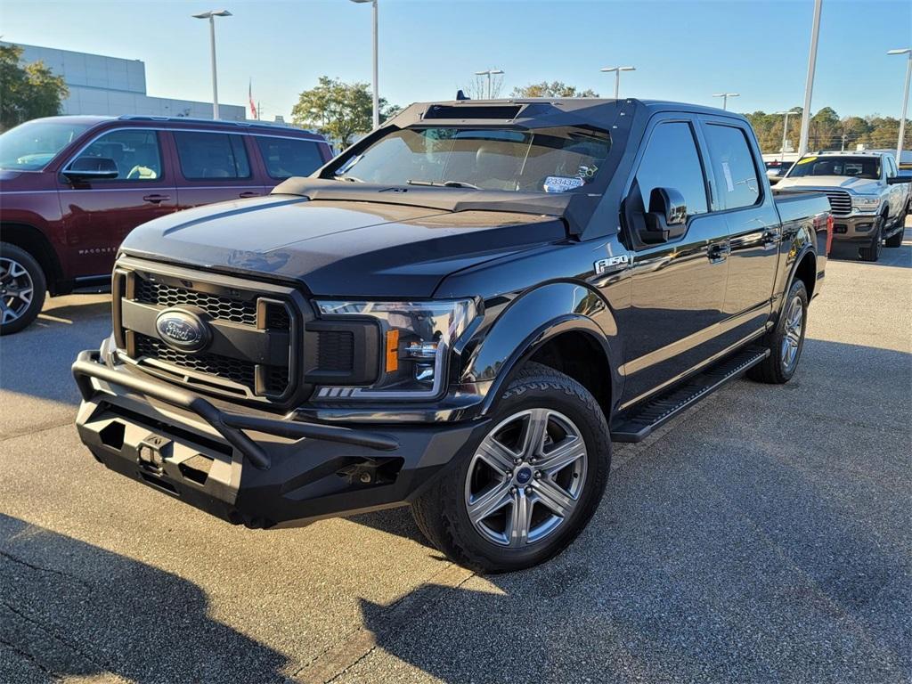 used 2018 Ford F-150 car, priced at $28,374