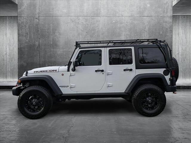 used 2016 Jeep Wrangler Unlimited car, priced at $24,993