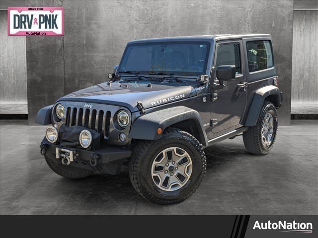 used 2014 Jeep Wrangler car, priced at $21,890