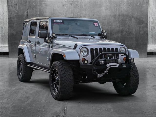 used 2013 Jeep Wrangler Unlimited car, priced at $18,462