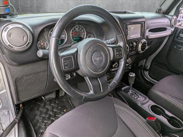 used 2013 Jeep Wrangler Unlimited car, priced at $18,462