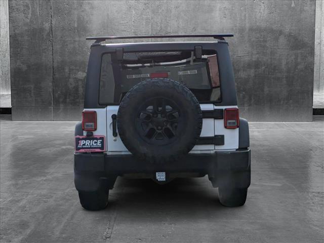 used 2016 Jeep Wrangler Unlimited car, priced at $24,264