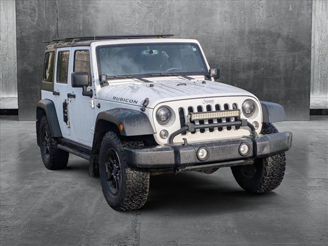 used 2016 Jeep Wrangler Unlimited car, priced at $24,264