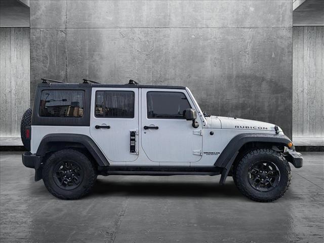 used 2016 Jeep Wrangler Unlimited car, priced at $24,264