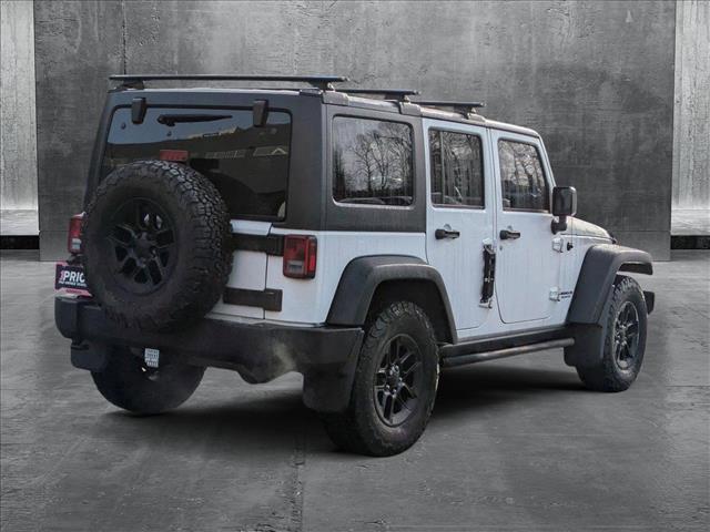 used 2016 Jeep Wrangler Unlimited car, priced at $24,264