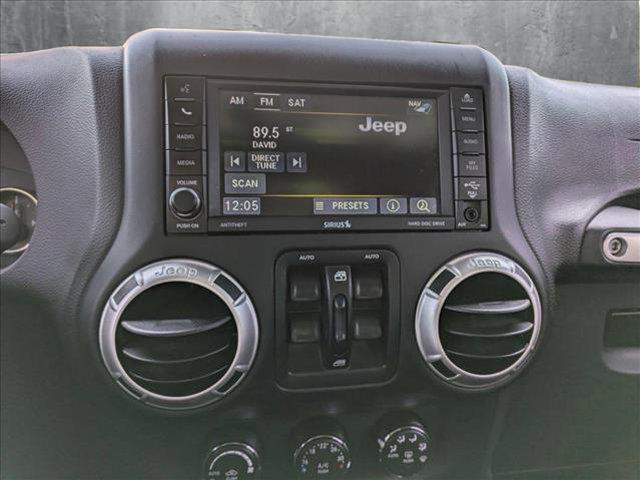 used 2016 Jeep Wrangler Unlimited car, priced at $24,264