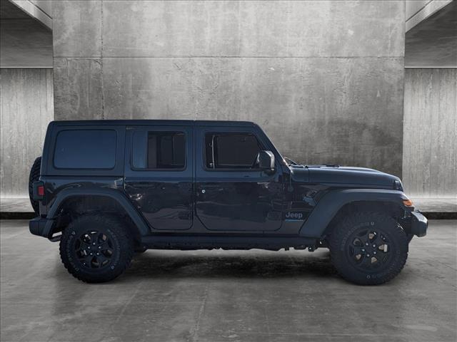 used 2023 Jeep Wrangler 4xe car, priced at $39,691