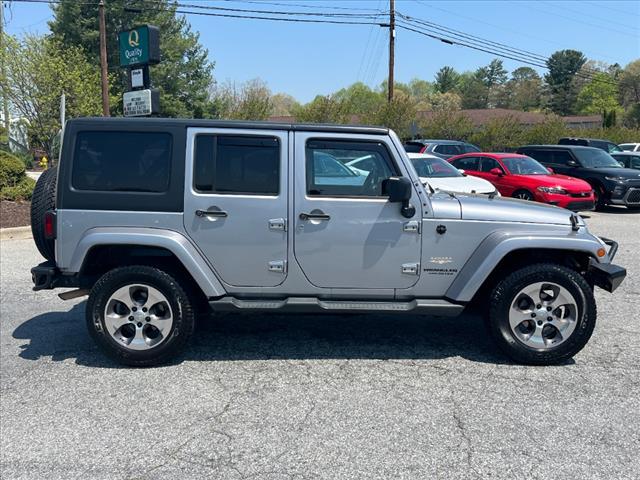 used 2014 Jeep Wrangler Unlimited car, priced at $18,239