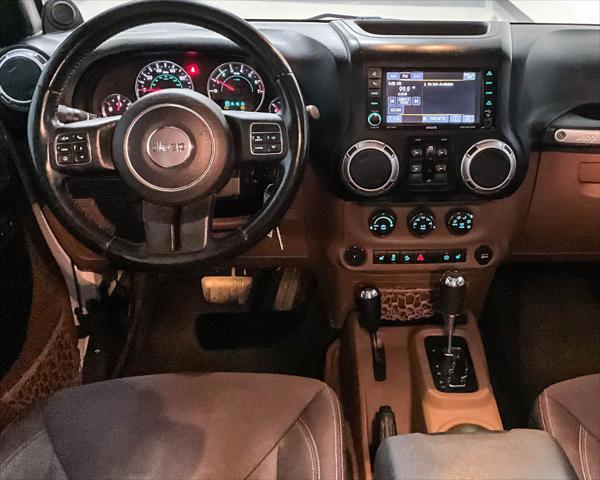 used 2013 Jeep Wrangler Unlimited car, priced at $11,945