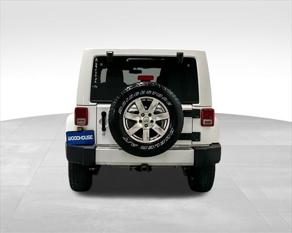 used 2013 Jeep Wrangler Unlimited car, priced at $11,945