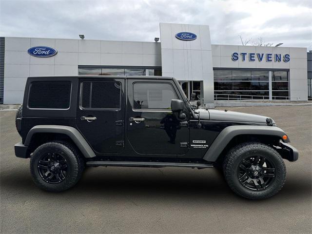 used 2015 Jeep Wrangler Unlimited car, priced at $14,990