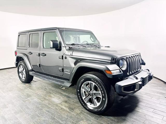 used 2021 Jeep Wrangler Unlimited car, priced at $25,527