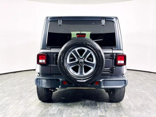 used 2021 Jeep Wrangler Unlimited car, priced at $25,527