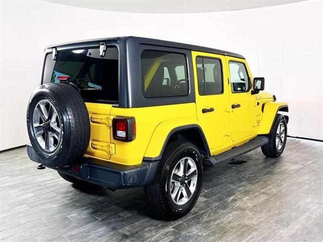 used 2021 Jeep Wrangler Unlimited car, priced at $26,427