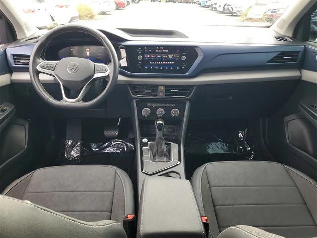 used 2023 Volkswagen Taos car, priced at $19,999