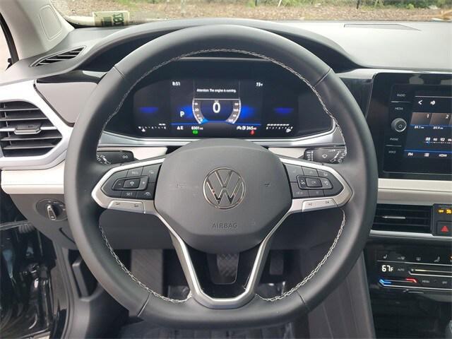 used 2025 Volkswagen Taos car, priced at $25,499