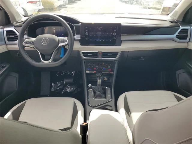 new 2025 Volkswagen Taos car, priced at $29,011