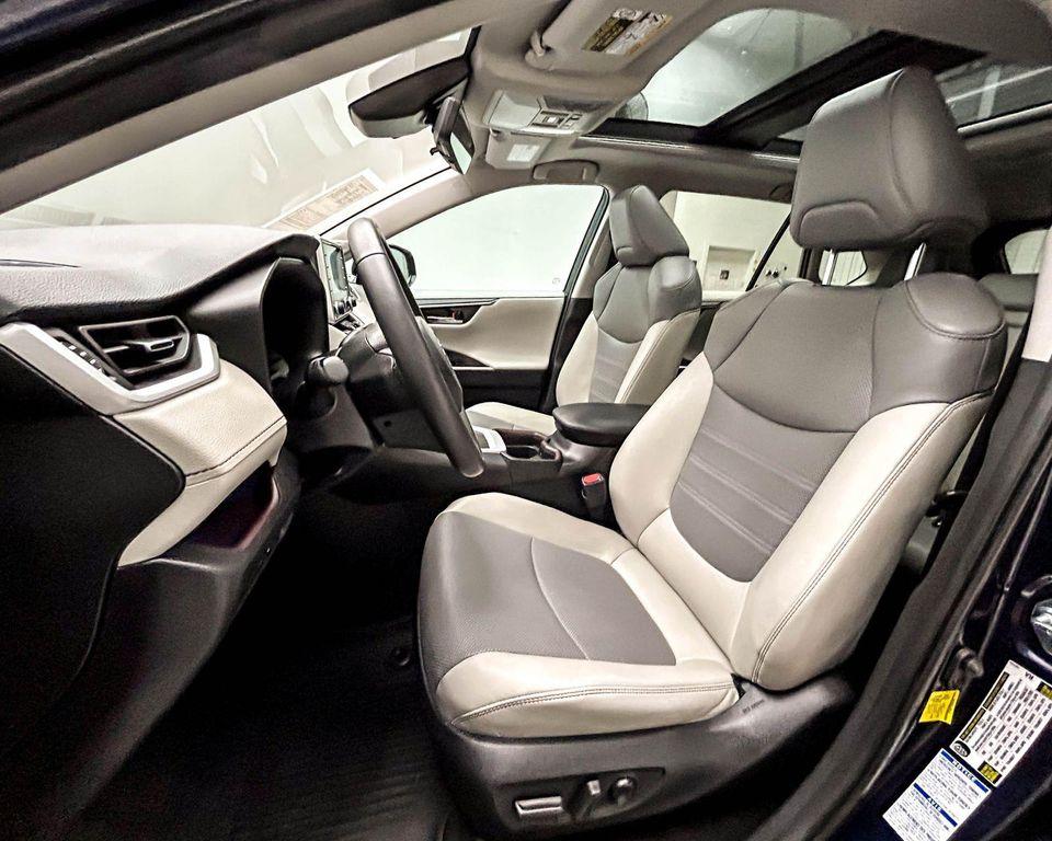 used 2021 Toyota RAV4 Hybrid car, priced at $27,588