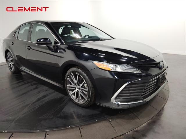 used 2022 Toyota Camry Hybrid car, priced at $28,000