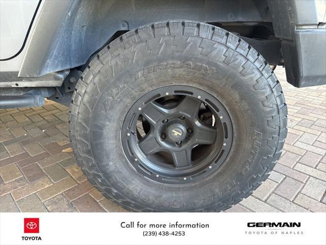 used 2014 Jeep Wrangler Unlimited car, priced at $16,986