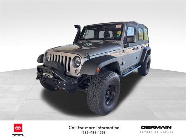 used 2014 Jeep Wrangler Unlimited car, priced at $16,986