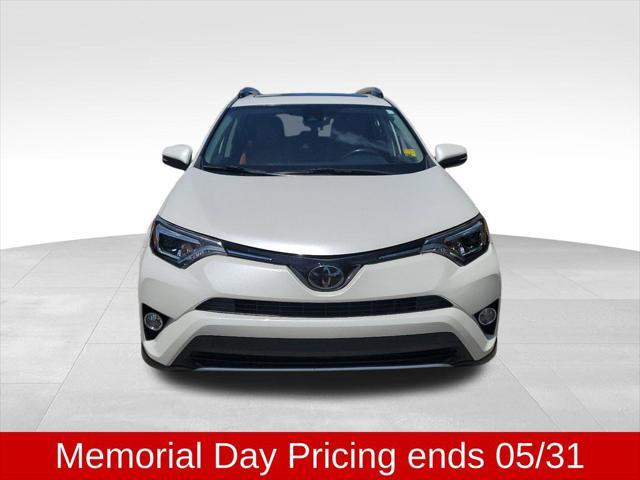 used 2018 Toyota RAV4 car, priced at $20,000