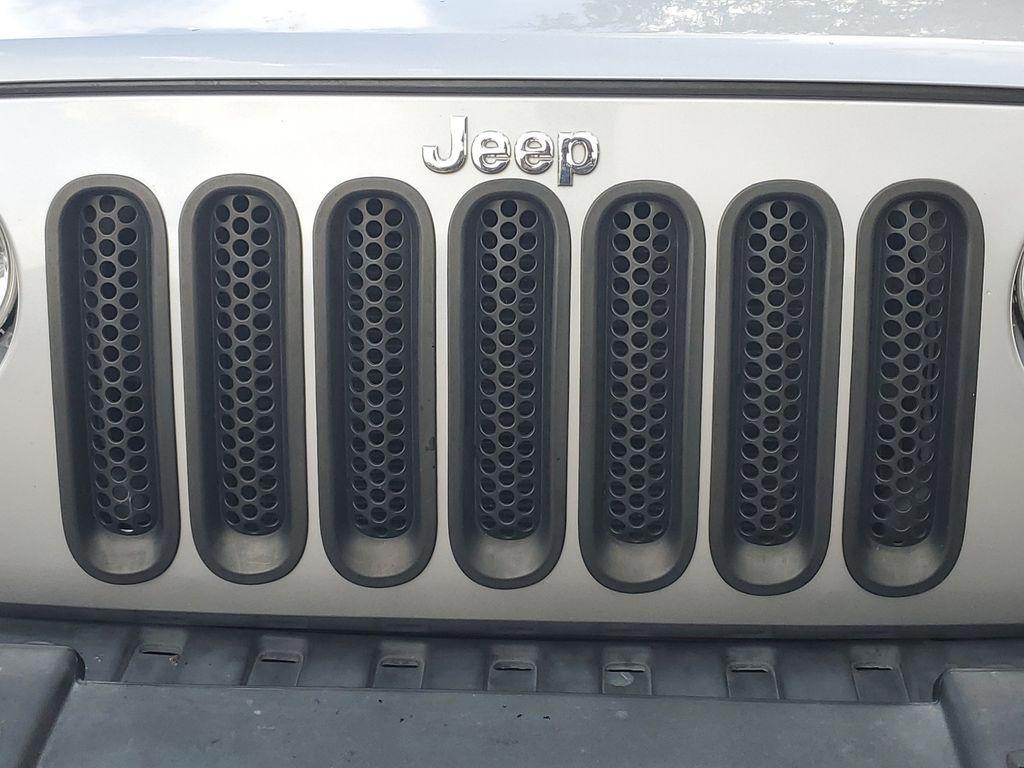 used 2013 Jeep Wrangler Unlimited car, priced at $15,800