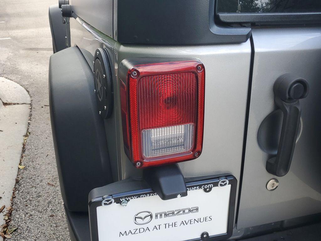 used 2013 Jeep Wrangler Unlimited car, priced at $15,800