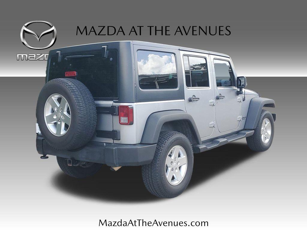 used 2013 Jeep Wrangler Unlimited car, priced at $15,800