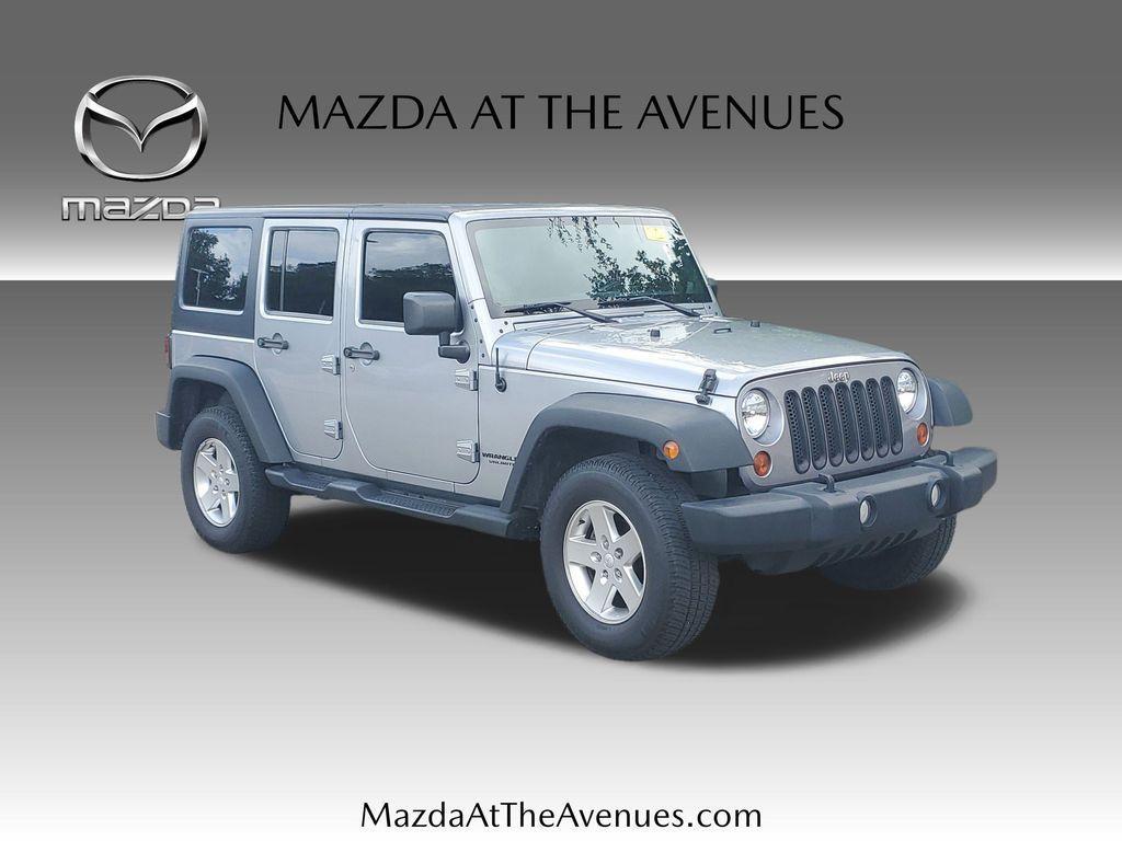 used 2013 Jeep Wrangler Unlimited car, priced at $15,800