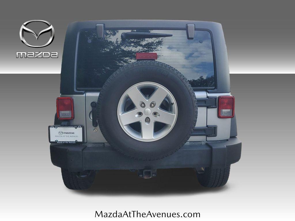 used 2013 Jeep Wrangler Unlimited car, priced at $15,800