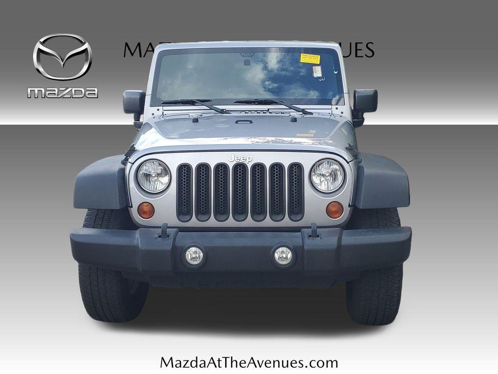 used 2013 Jeep Wrangler Unlimited car, priced at $15,800