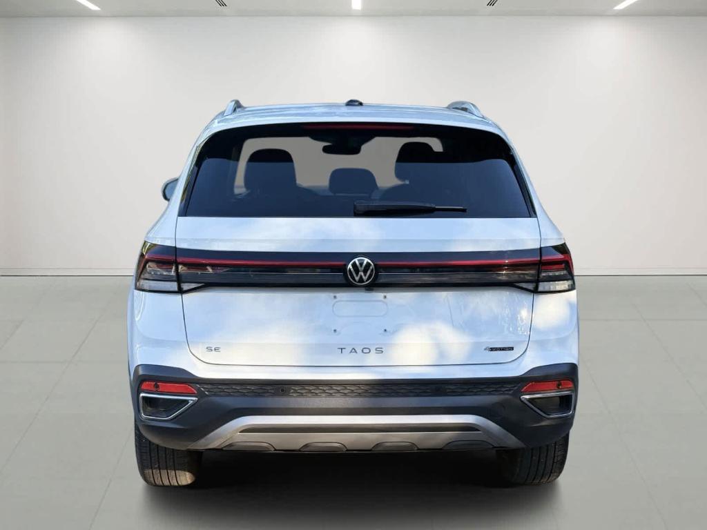 used 2025 Volkswagen Taos car, priced at $29,699