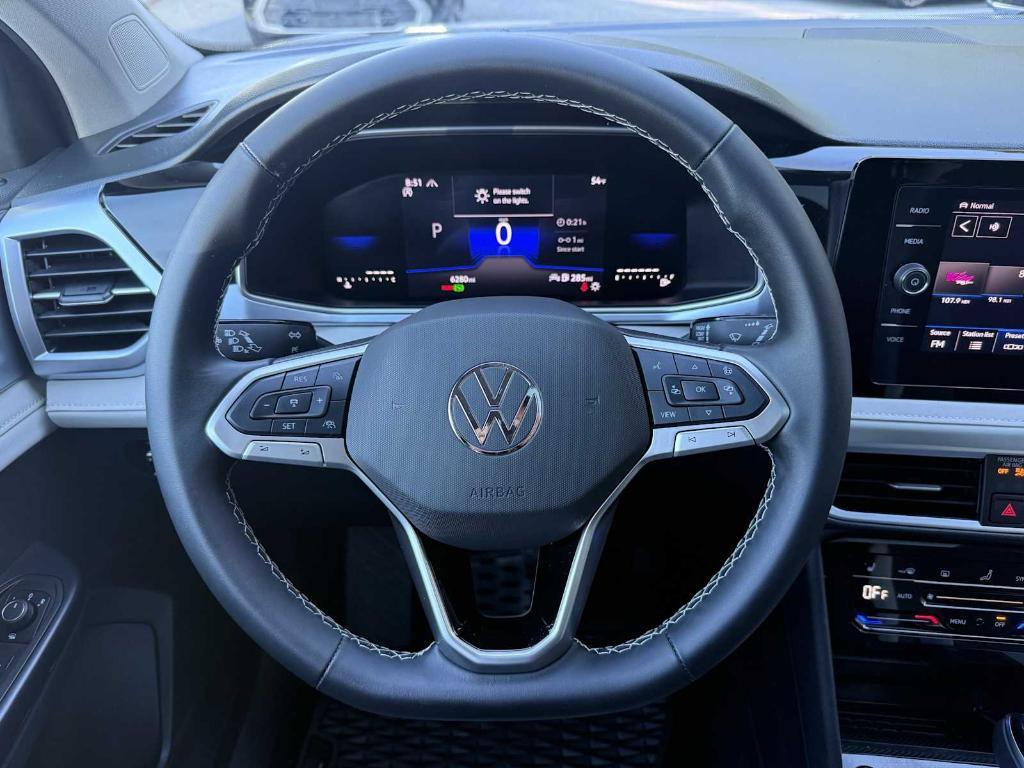 used 2025 Volkswagen Taos car, priced at $29,699