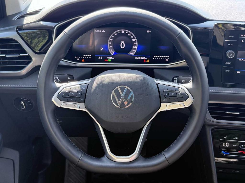 used 2025 Volkswagen Taos car, priced at $32,039