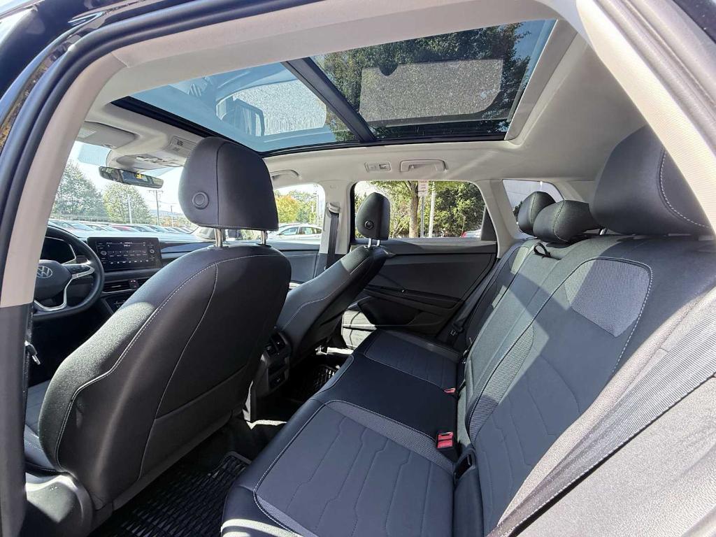 used 2025 Volkswagen Taos car, priced at $32,039