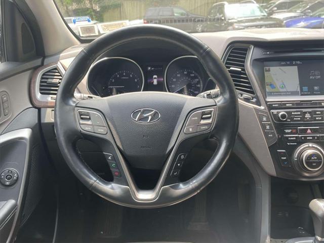 used 2018 Hyundai Santa Fe car, priced at $19,999