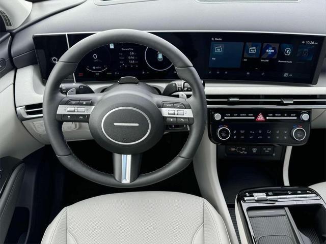 new 2025 Hyundai TUCSON Hybrid car, priced at $42,085