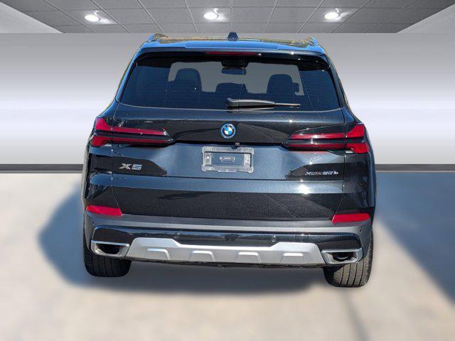 used 2025 BMW X5 PHEV car, priced at $56,899