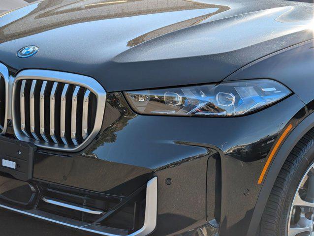 used 2025 BMW X5 PHEV car, priced at $56,899
