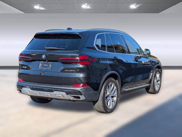 used 2025 BMW X5 PHEV car, priced at $56,899